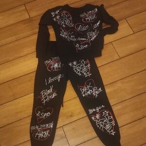 Philipp Plein Black Track Pants & Joggers with Red and White Accents